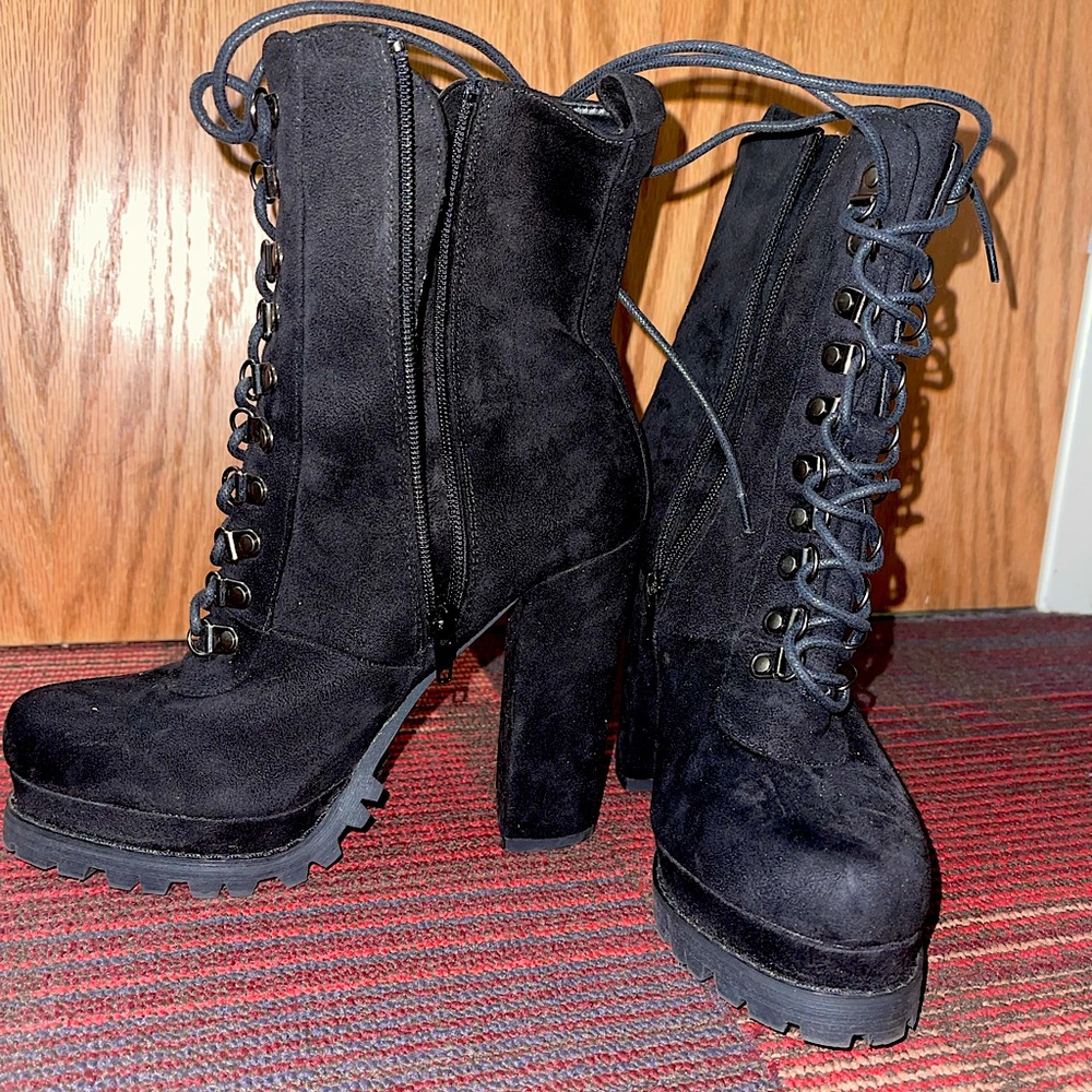 High heeled black boots